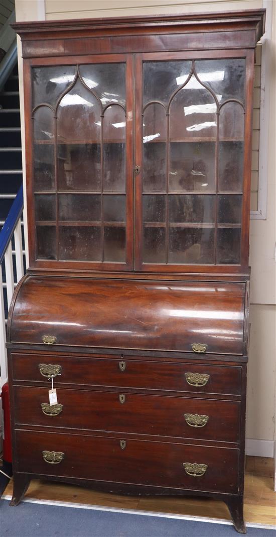 A George IV mahogany cylinder bureau bookcase W.106cm